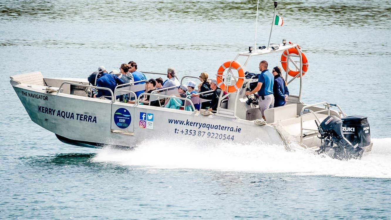 Group of people on a boat tour at sea with Kerry Aqua Terra