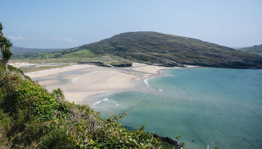 Sandy beach and sea with hills