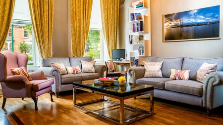 Lounge area with timber floor.