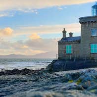 Blacksod Lighthouse with the sea in the back ground