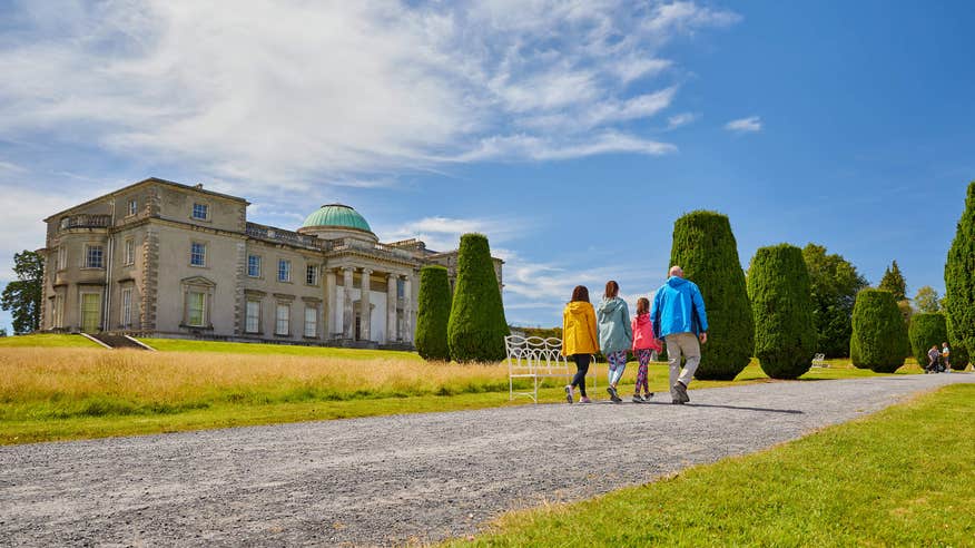 Family walking by Emo Court in Laois.