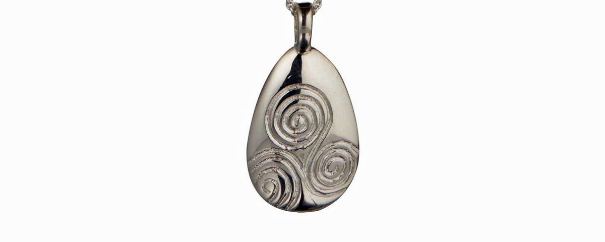 Sterling silver pendant based on the design from the entrance stone of the Newgrange heritage site