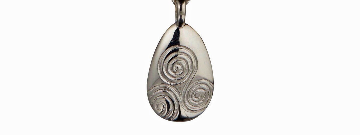 Sterling silver pendant based on the design from the entrance stone of the Newgrange heritage site