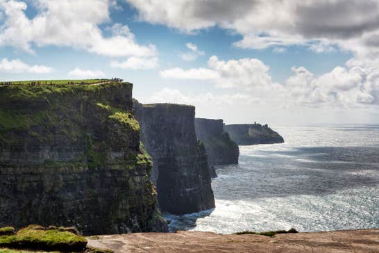 Sunny day with some low lying clouds at Cliffs of Moher, County Clare