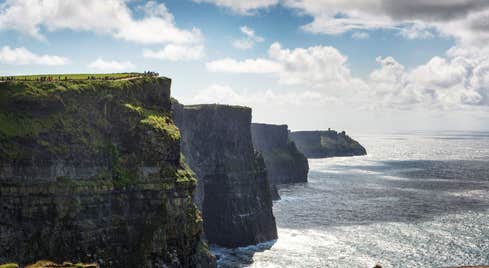 Sunny day with some low lying clouds at Cliffs of Moher, County Clare