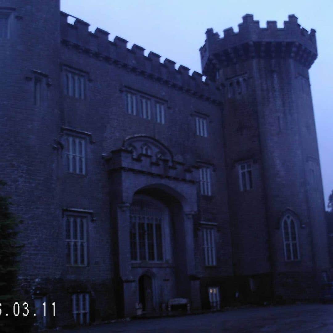A dark, old picture of Charleville Castle in Offaly taken just before nightfall.