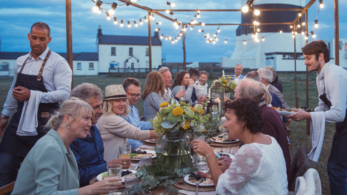 Dine under lights beside the mighty lighthouse.