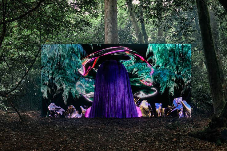 A colourful art installation in the woodland at Ballinlough Castle for the Body and Soul festival.