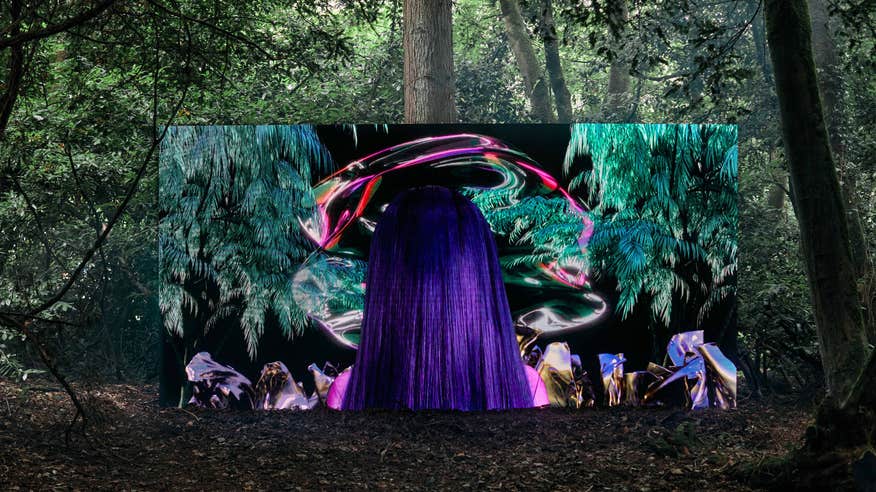 A colourful art installation in the woodland at Ballinlough Castle for the Body and Soul festival.