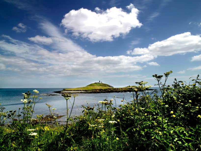 Ballycotton Lighthouse in County Cork in the distance 