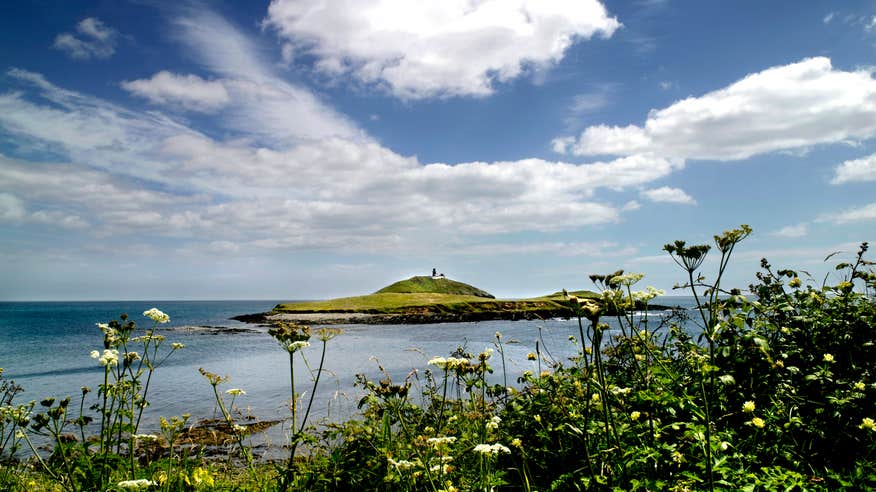 Ballycotton Lighthouse in County Cork in the distance