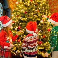 Young visitors at the Christmas tree in the formal hall of Turlough Park House. Image: John Mee