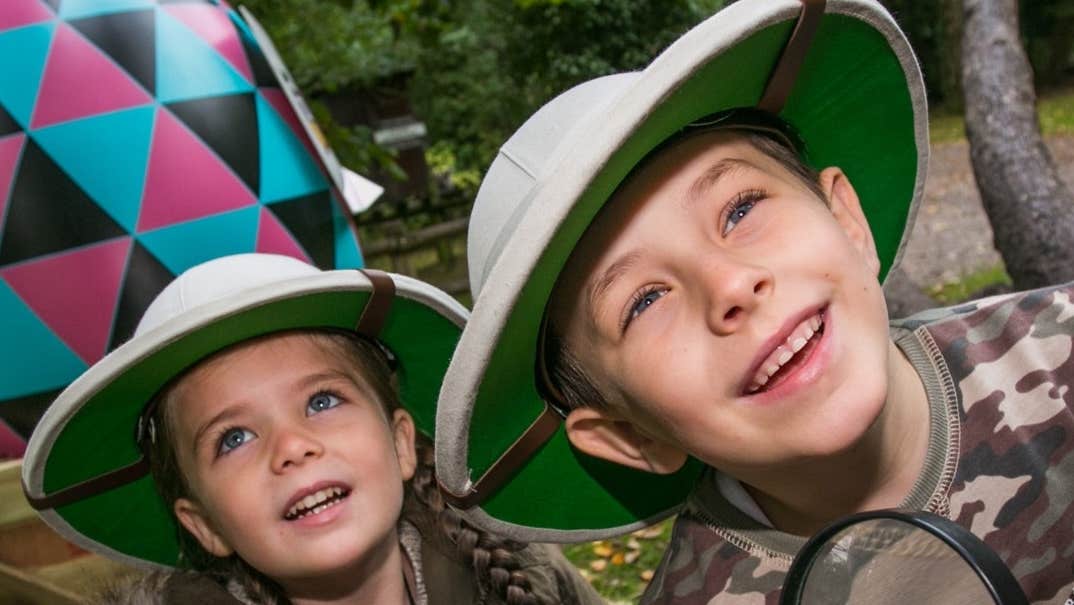2 young children in explorer style hats