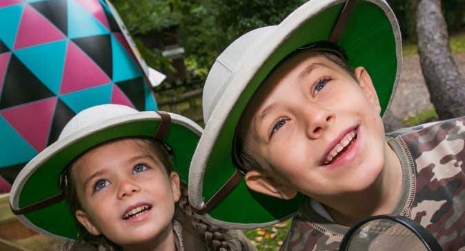 2 young children in explorer style hats