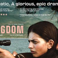 Cinema poster with text and a frowning woman looking through the sights of a rifle