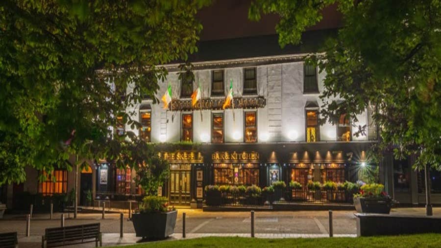 front night time view of hotel