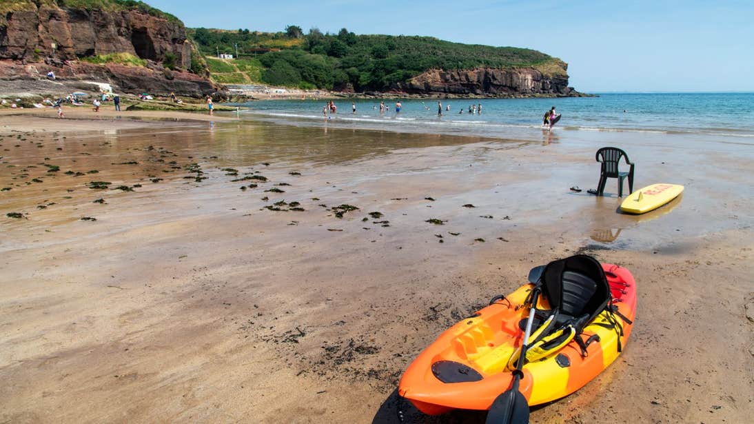 A kayak beside the water at Dunmore East Beach, Waterford