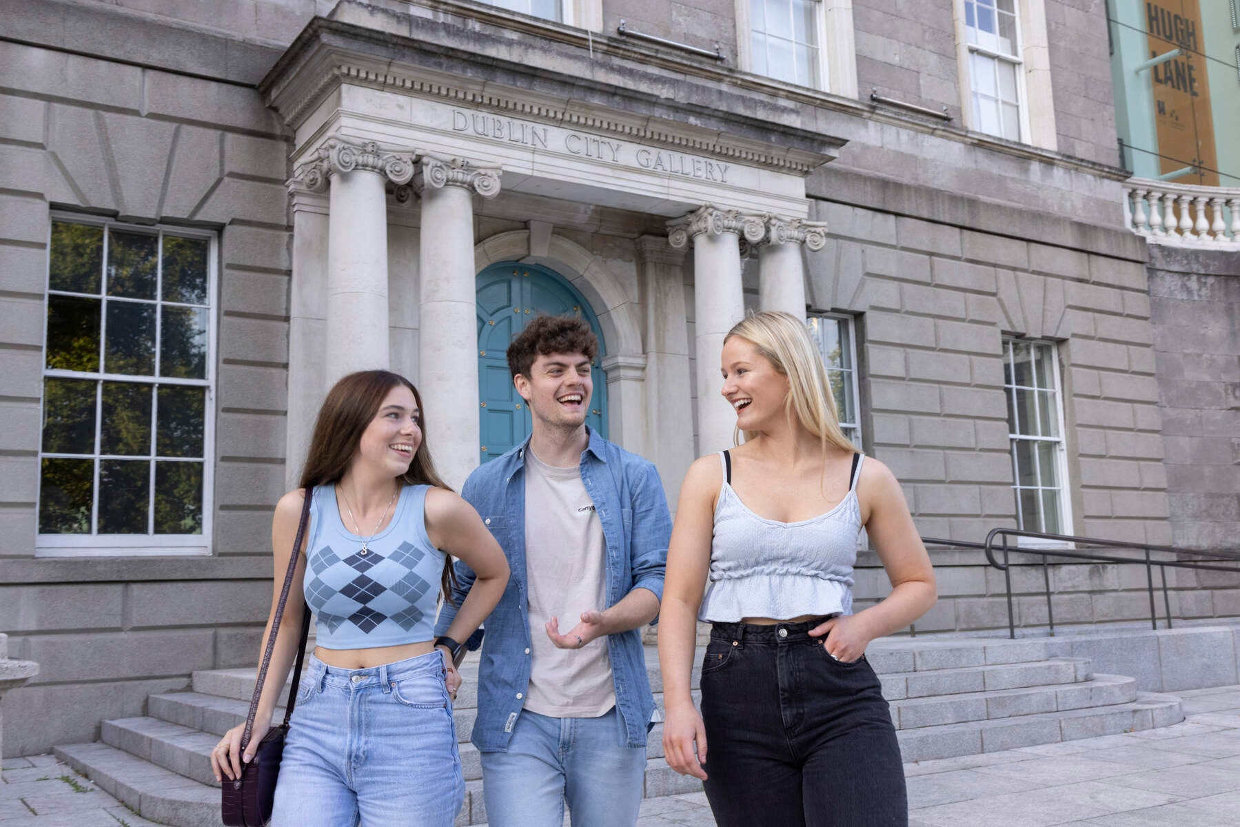 Three friends leaving the Hugh Lane Gallery in Dublin.