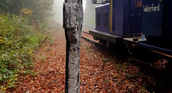 The Waterford Suir Valley Railway train journeys through the creepy graveyard on Waterford Greenway, beside the enchanting River Suir