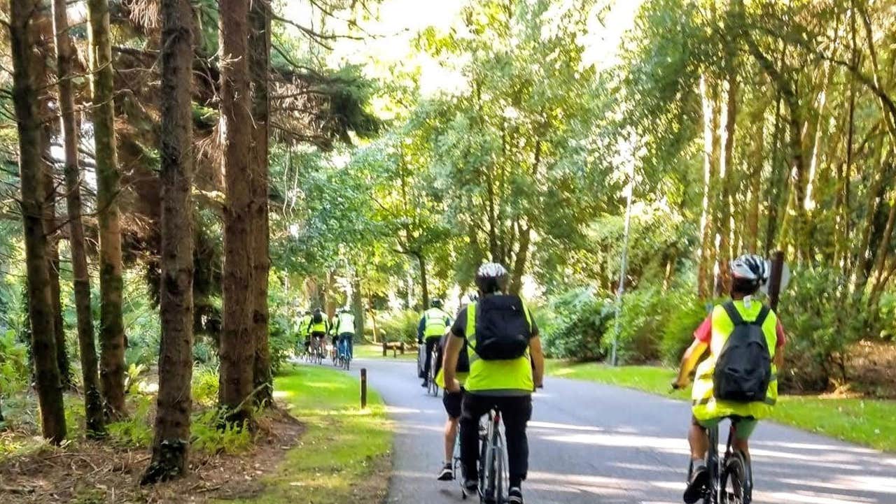A group on a cycle tour on the greenway