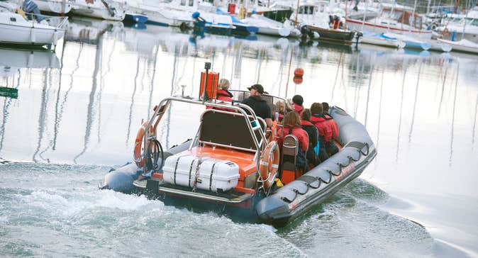 A group of people on a boat at Kinsale Harbour in County Cork