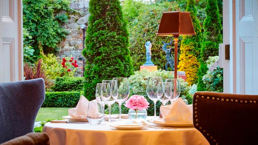 Orchids dining table overlooking the garden