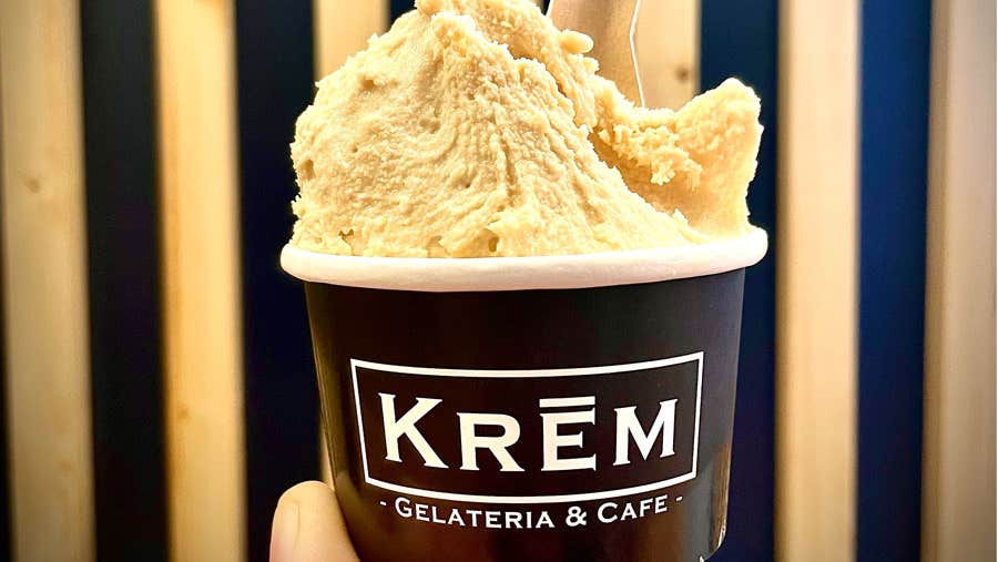 A cup with spoon of Krem hazelnut gelato at Krem Gelateria and Café