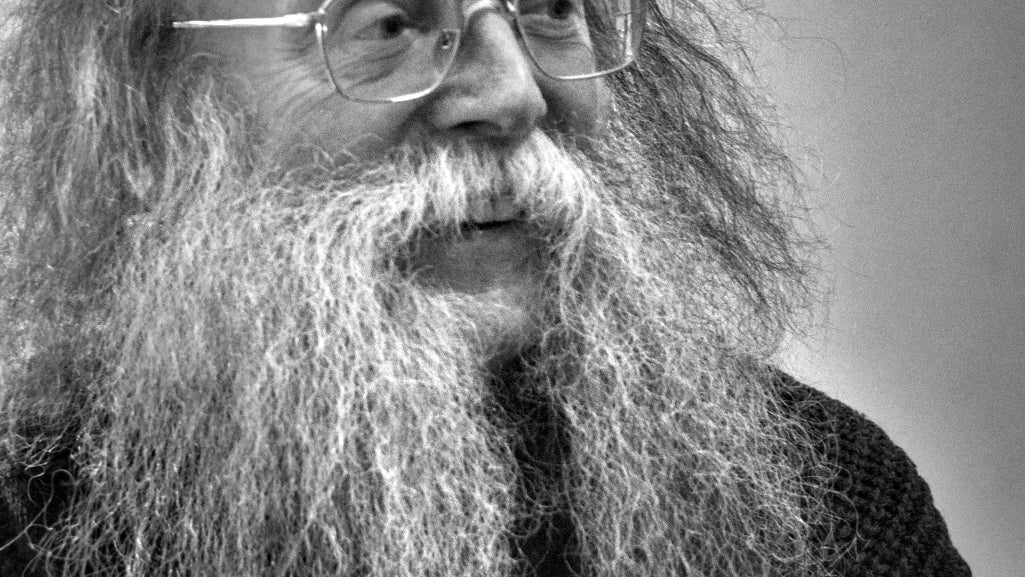 Eddie Lenihan Irish author, storyteller, lecturer - an older man in glasses with long, fuzzy beard and hair.