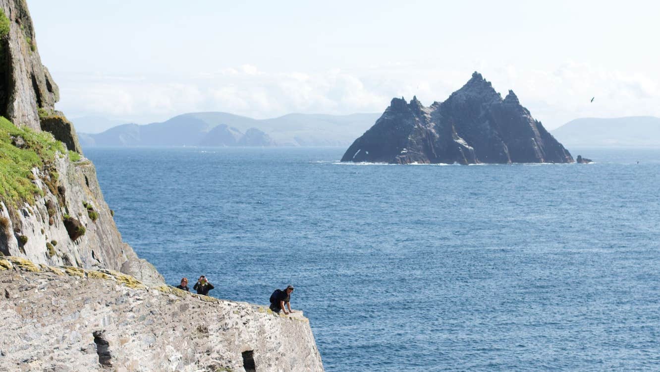 Skellig Michael viewed from a coastal path along Ireland's Atlantic shoreline