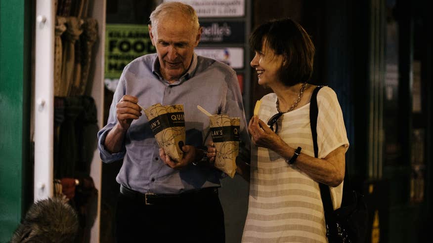 Two people eating fish and chips in Killarney, Kerry