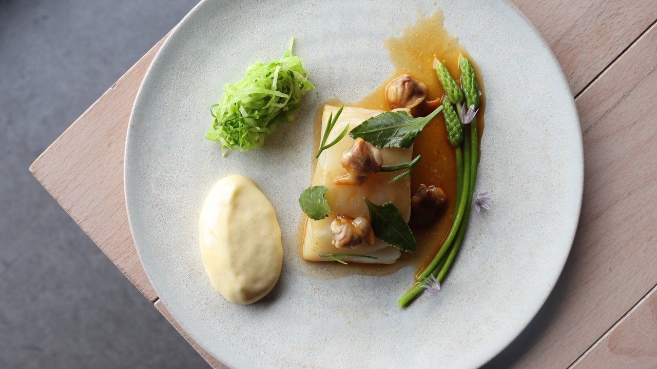 A cod cockles mushroom and cep sauce dish served at Bastible