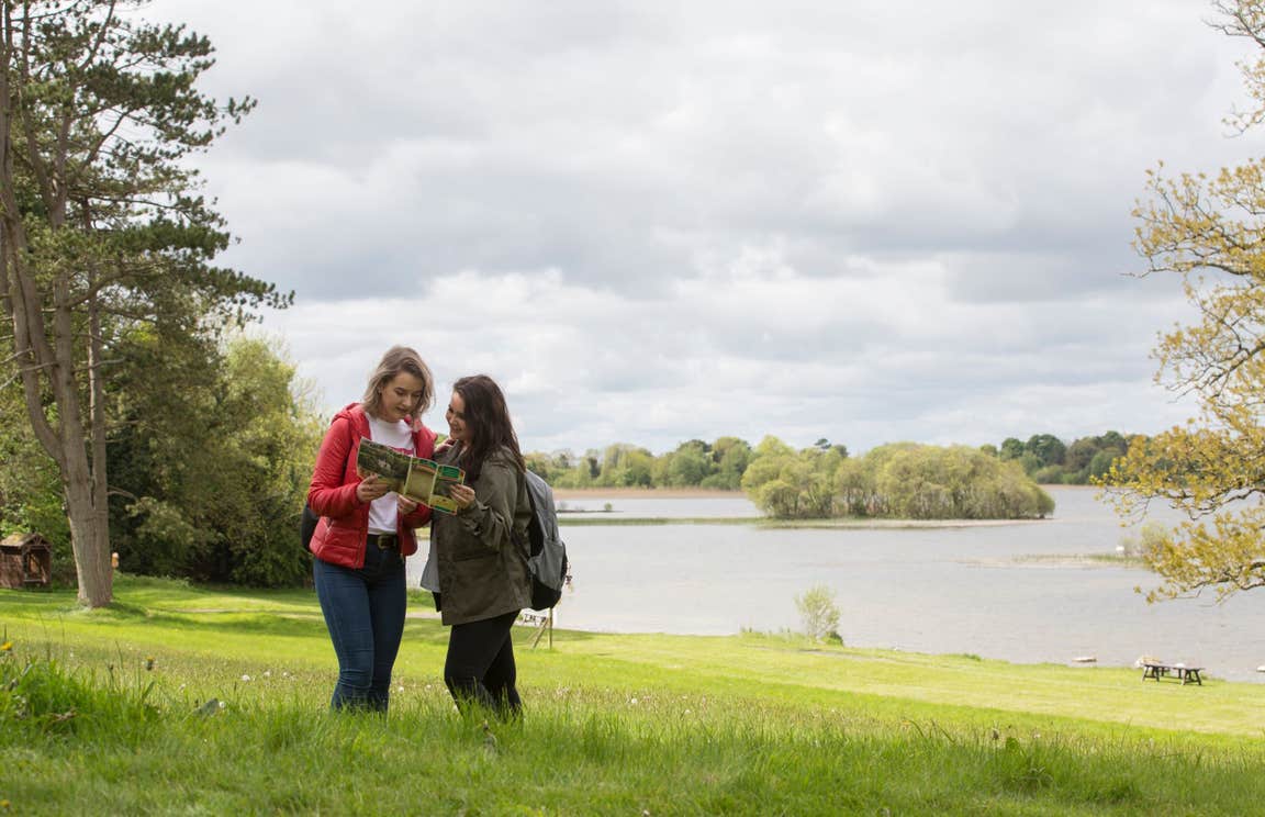 Two people exploring the grounds of Belvedere House, Westmeath