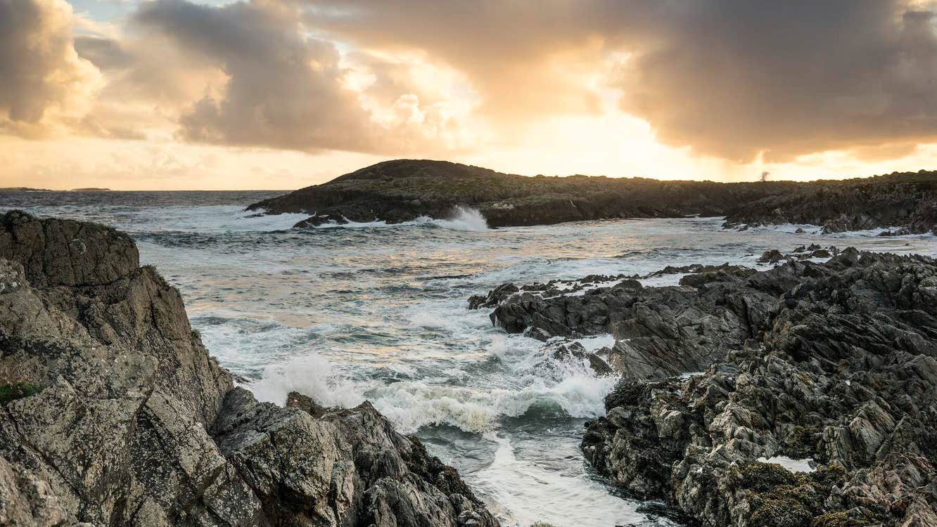 The Atlantic Ocean hitting off of rocks in Ceann an Eanaigh in County Mayo.