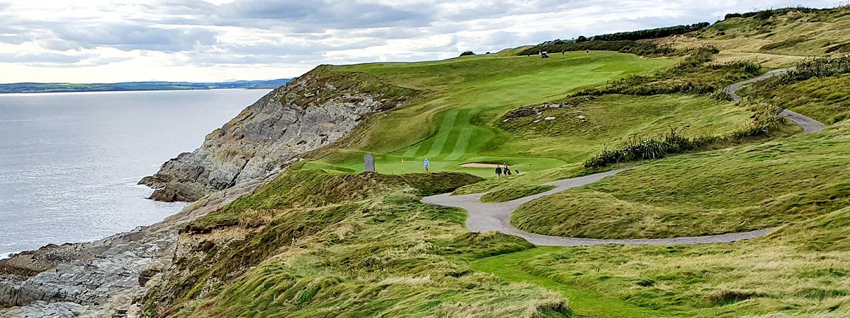 G Golf Ireland view of the course at the Old Head of Kinsale with cliffs and the sea