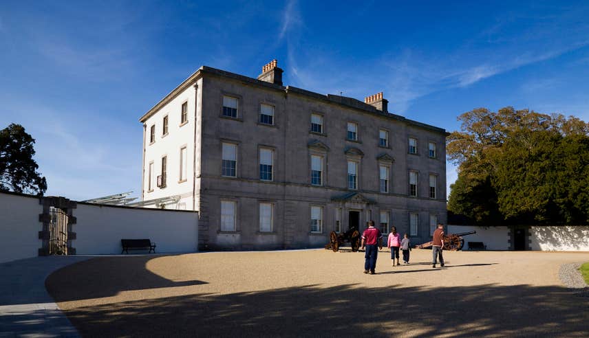 People walking into the Battle of the Boyne Visitor Centre at Oldbridge House in County Meath.