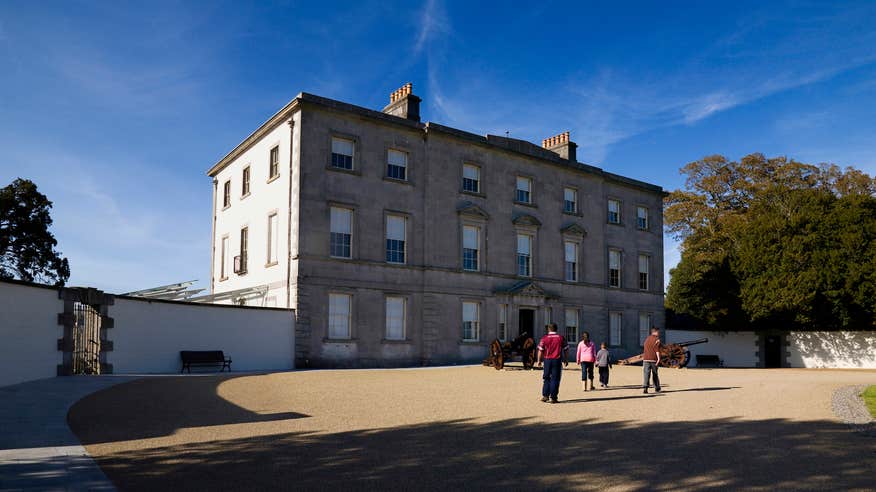 People walking into the Battle of the Boyne Visitor Centre at Oldbridge House in County Meath.