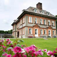 Green grass and colourful flowers at Beaulieu House and Gardens, County Louth