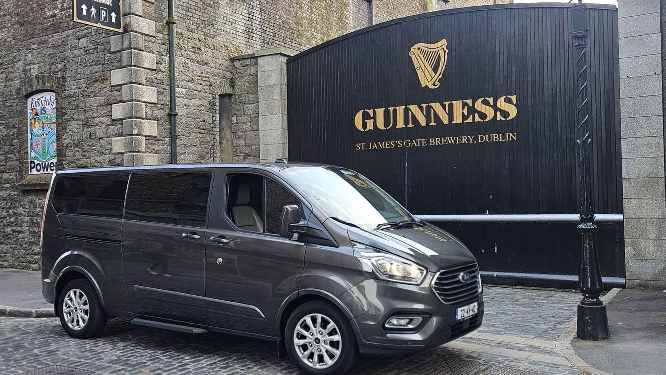 A luxury mini bus parked at the Guinness Storehouse gates
