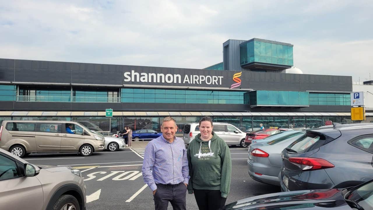 Peter Gibbons and his customer standing in the car park at Shannon Airport