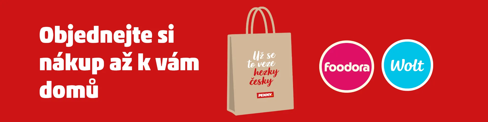 Banner propagující objednání nákupu domů přes aplikace Foodora a Wolt. Na obrázku je zobrazen nákupní taška s nápisem 'Už se to veze hezky česky' a logy aplikací Foodora a Wolt. Nad taškou je text 'Objednejte si nákup až k vám domů'.