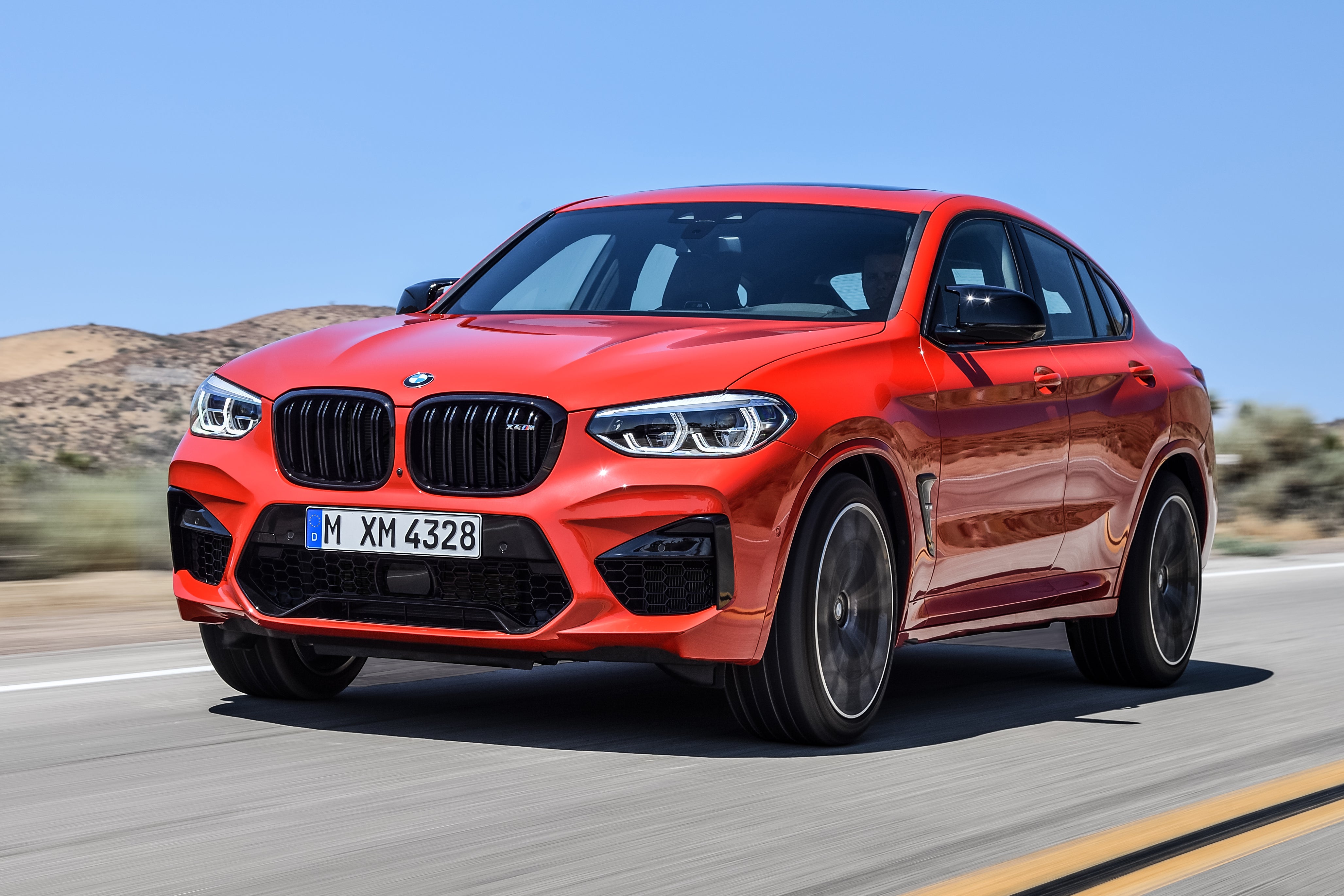 BMW X4 M Competition Review 2022 dynamic front-three quarter