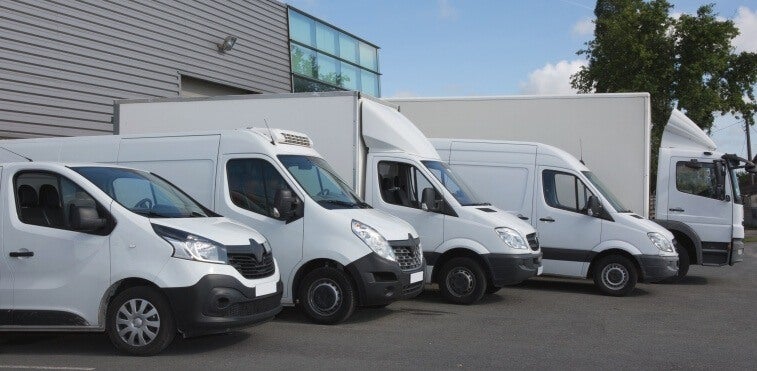 Vans parked close together to prevent catalytic converter theft