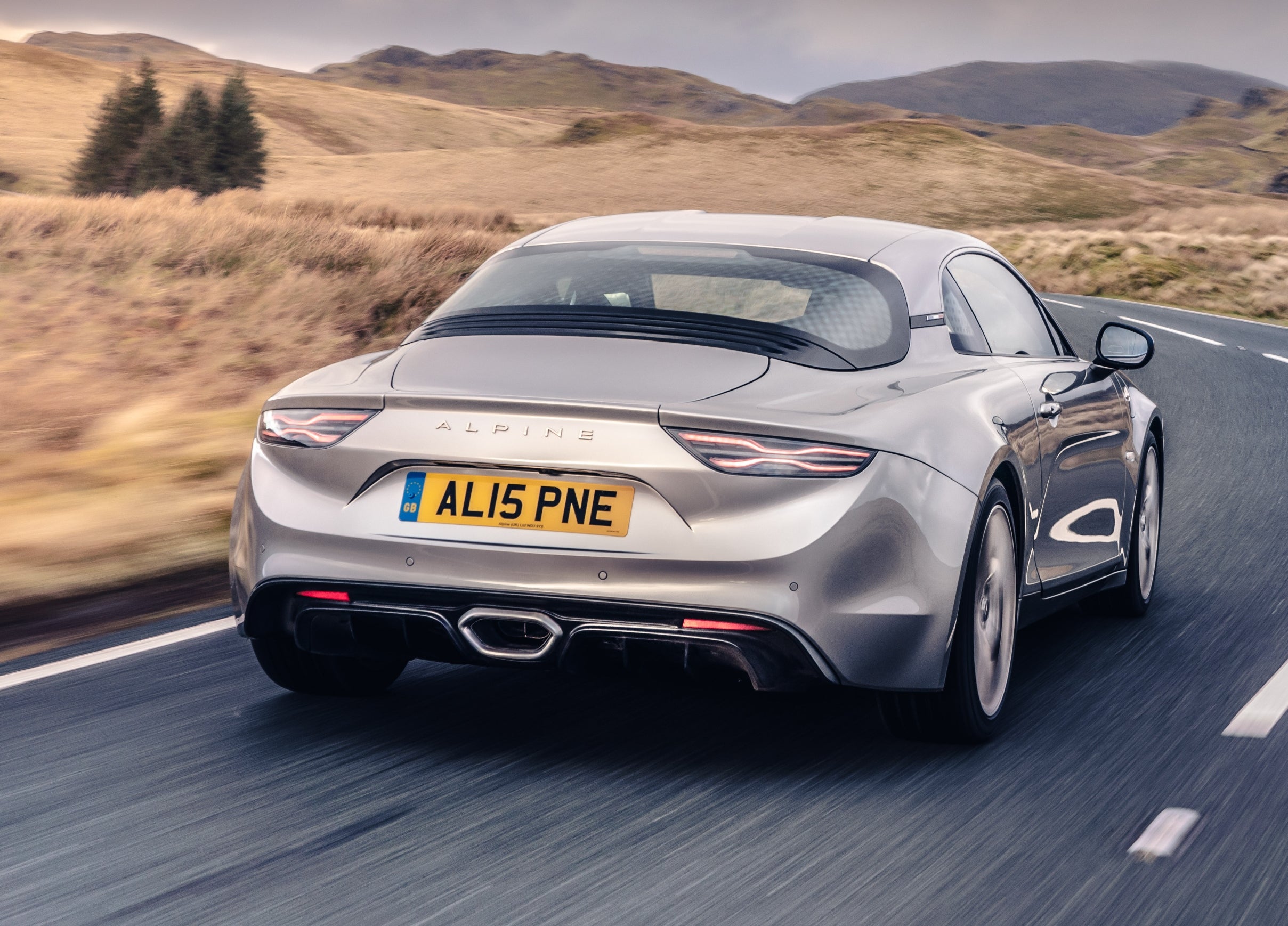 Gurgles and crackles emanate from the A110's single exhaust