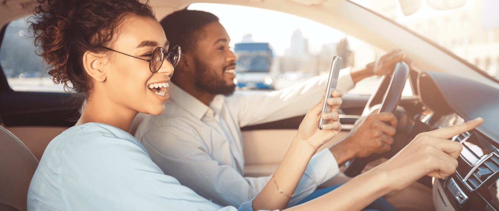 A couple enjoying driving