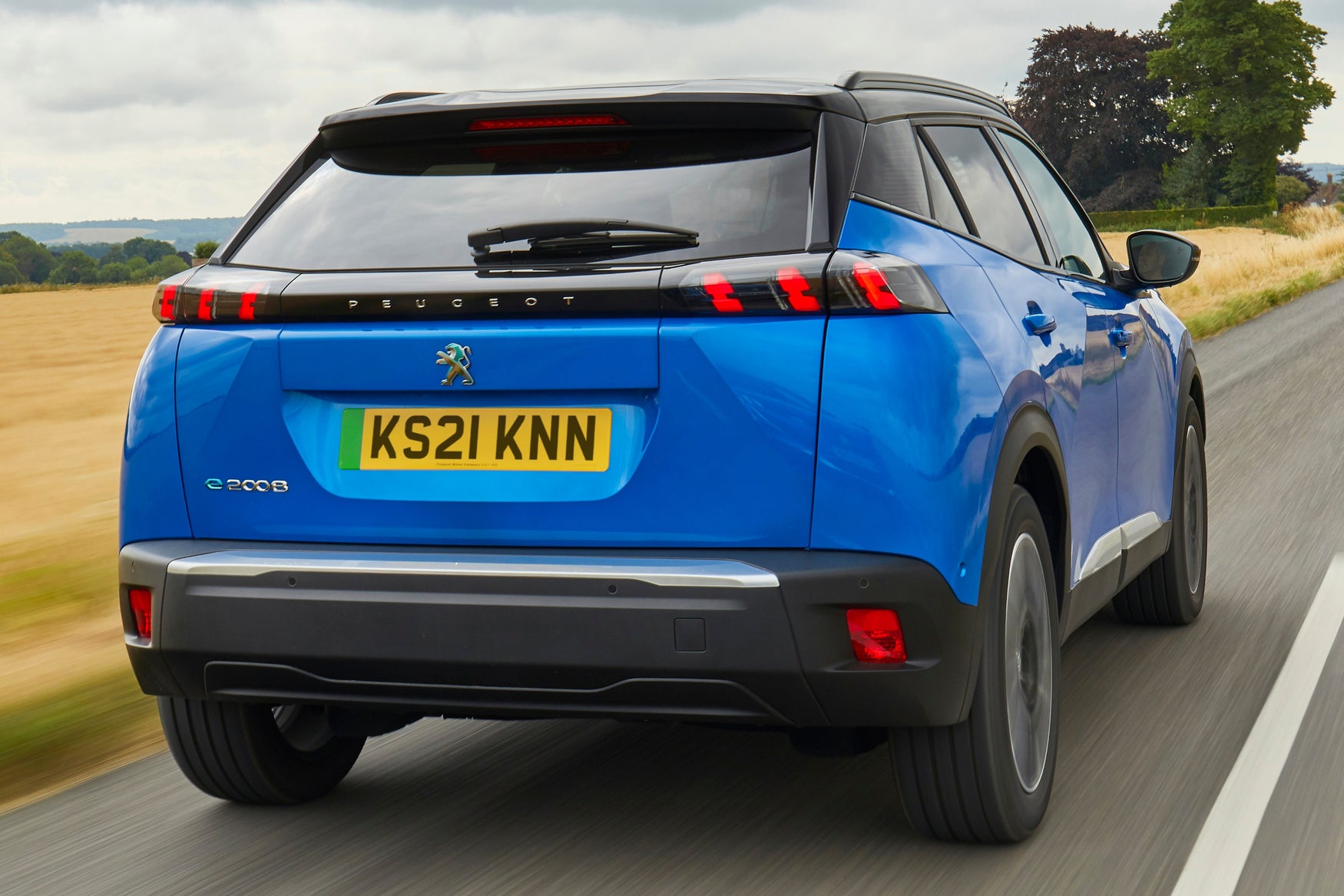 New 2022 Peugeot e-2008 on the road rear