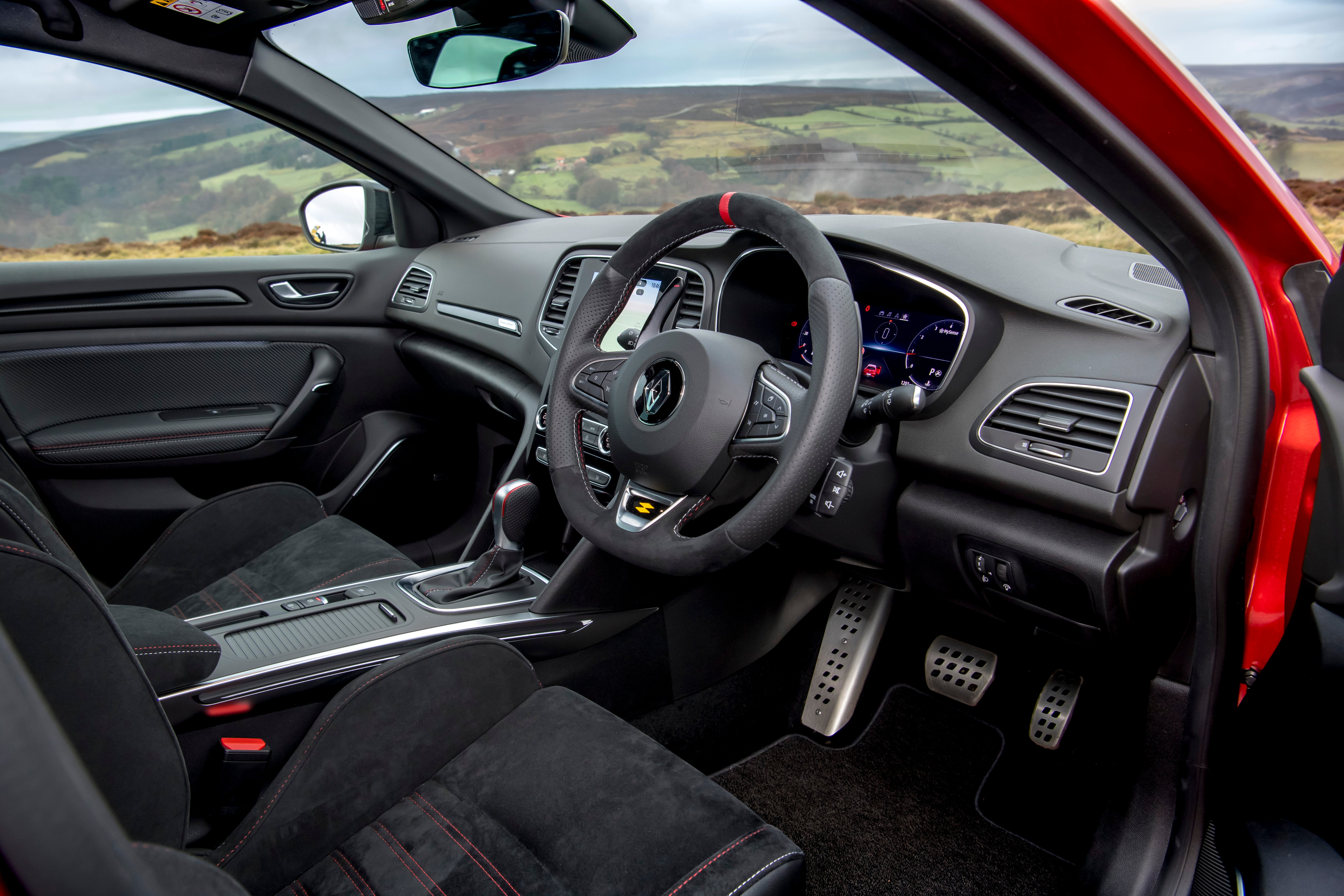 The Megane's interior feels well built and purposeful