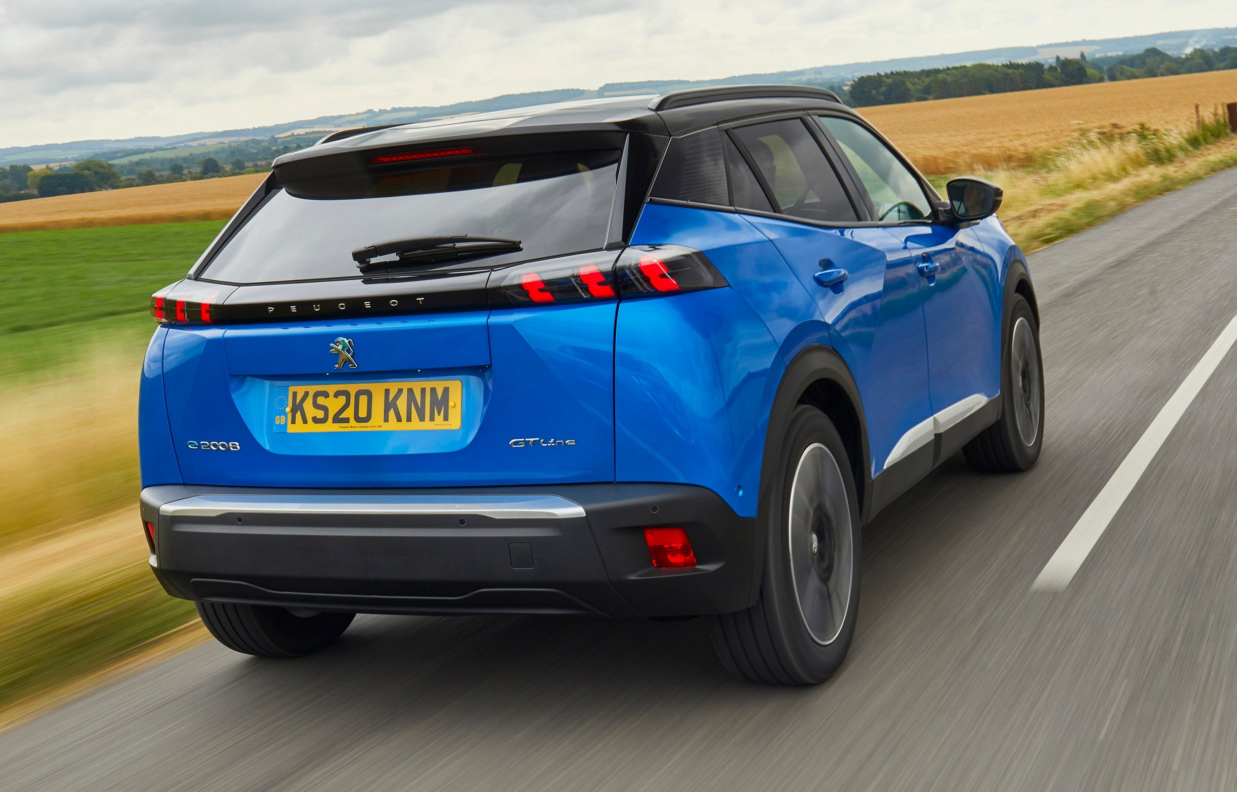 Peugeot e-2008 Review 2022 rear-three quarter dynamic