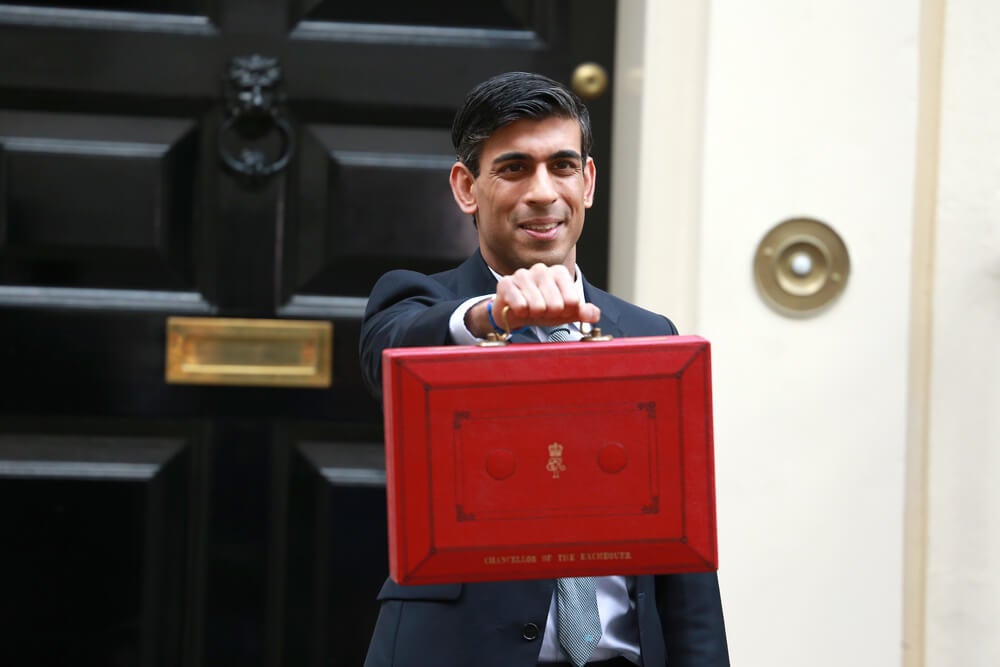 Chancellor Rishi Sunak holding the red briefcase outside No. 11 Downing Street