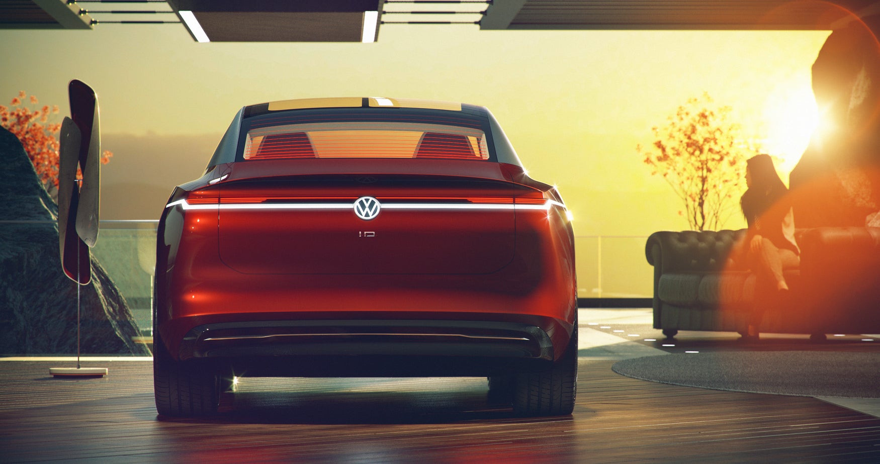 Volkswagen ID.Vizzion in red from behind facing setting sun