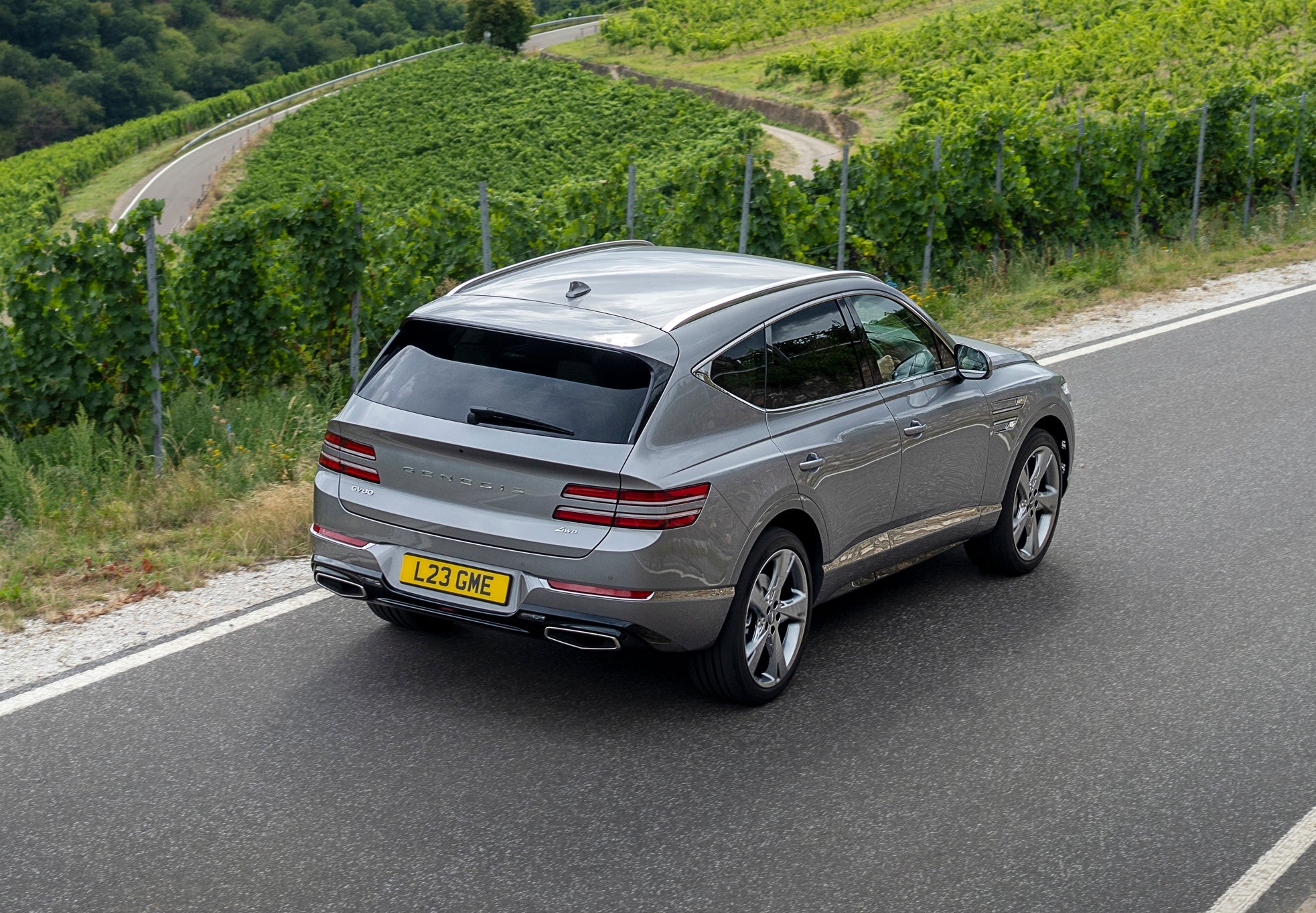 Stacked headlights, indicators and tail lights emphasis Genesis' 'two line' design theme